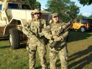 Two members of the Combined Tactical Unit in camouflaged uniforms